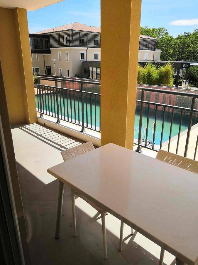 Appartement de vacances pour 4 personnes, avec Balcon et Terrasse ainsi que Jardin et Piscine