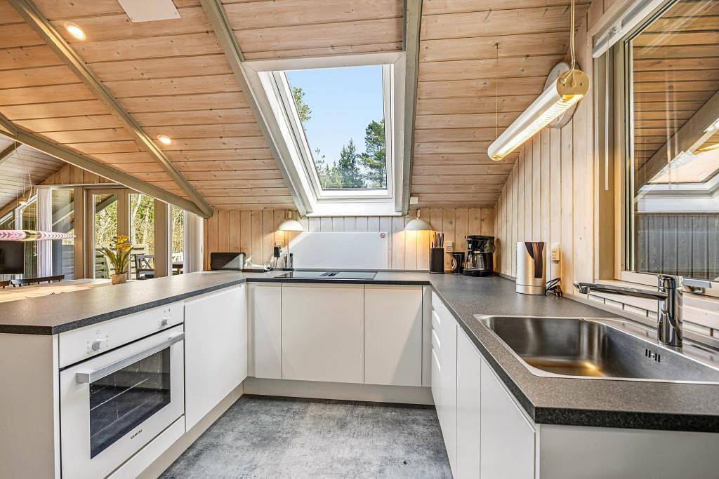 Charmantes Ferienhaus mit Kaminofen im Wald in Ho in Ho, Varde