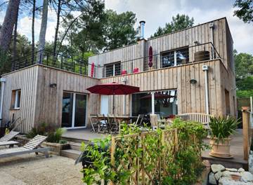 Cottage pour 8 personnes, avec balcon ainsi que jardin et vue sur le lac dans Plage Moutchic