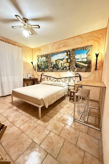 Chambre d’hôte pour 3 personnes, avec jardin et vue dans La Maddalena