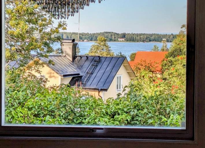 Vakantiehuis voor 8 personen, with sauna and uitzicht op het meer as well as uitzicht and tuin in Uppsala