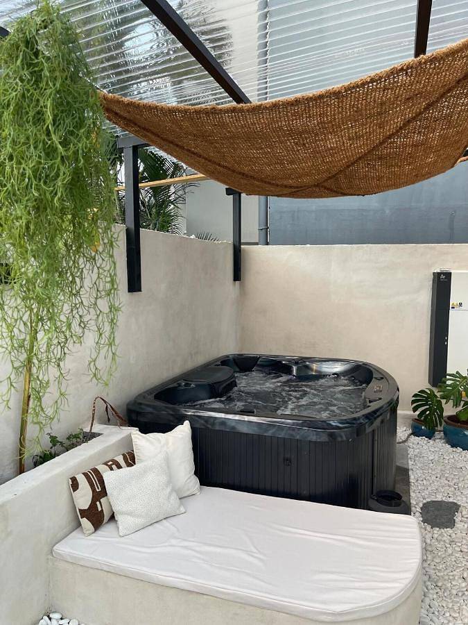 Appartement de vacances pour 3 personnes, avec jacuzzi ainsi que jardin et terrasse