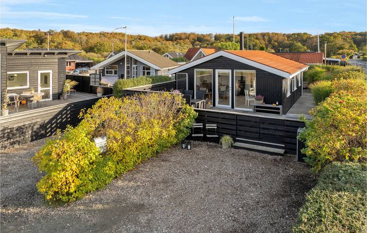 Ferienhaus für 4 Personen, mit Terrasse und Garten in Hejsager Strand