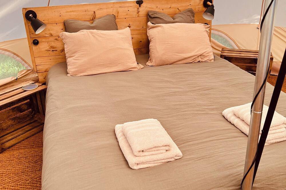 A Comfortable Nature Getaway at Moulin de Saza: Glamping Tent with a Pool in Le Vigeant, Vienne