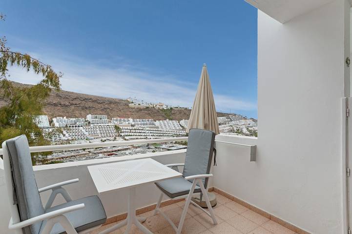 Apartamento entero, Apartamento de vacaciones 'Dreams' con vistas al mar, piscina compartida y Wi-Fi in Puerto Rico (Gran Canaria), Mogán