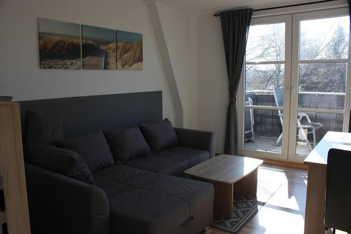 Ferienwohnung für 3 Personen, mit Balkon und Terrasse sowie Garten in Lichtenhagen