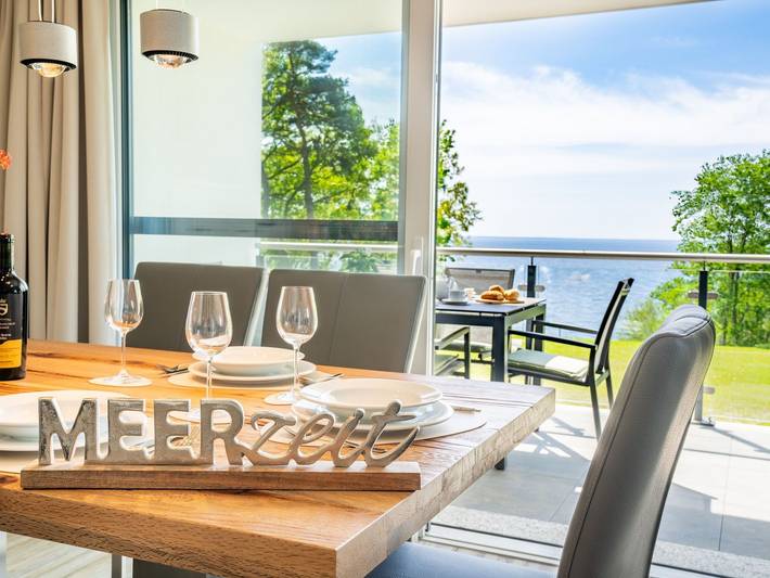 Ferienwohnung für 7 Personen, mit Balkon und Garten sowie Sauna und Seeblick