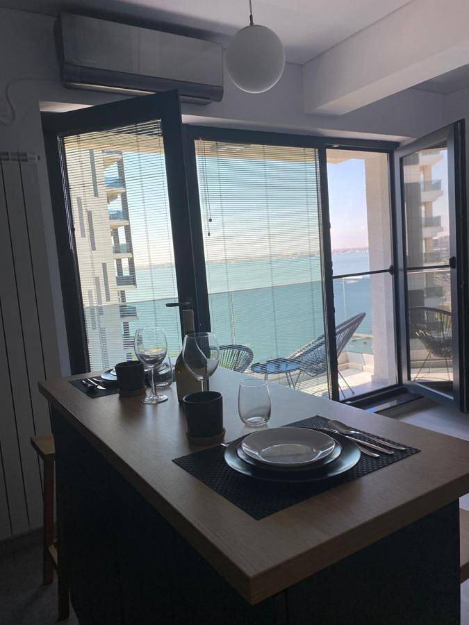 Appartement de vacances pour 2 personnes, avec jardin ainsi que vue et vue sur le lac