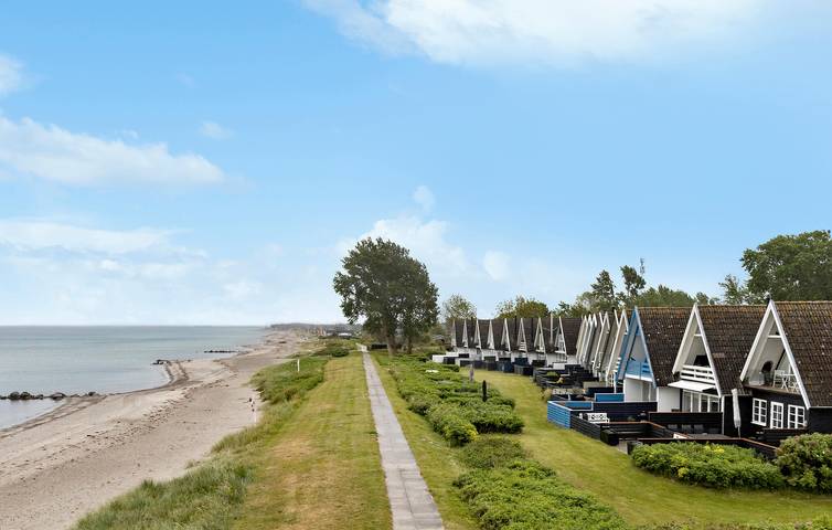Ferieudlejning for 3 personer, med Terrasse og Have i Hasmark Strand