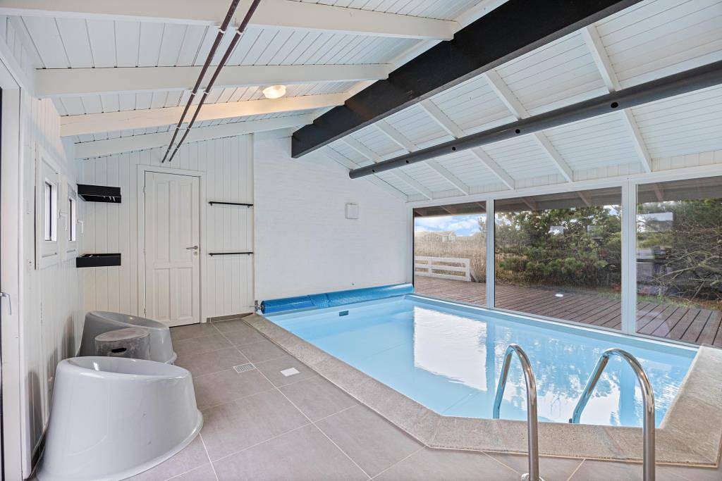 Moderne sommerhus til 10 personer med pool, sauna og spabad in Ringkøbing, Holmsland Klit