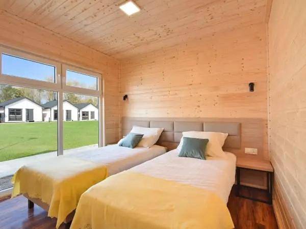 Lodge für 4 Personen, mit Terrasse und Garten