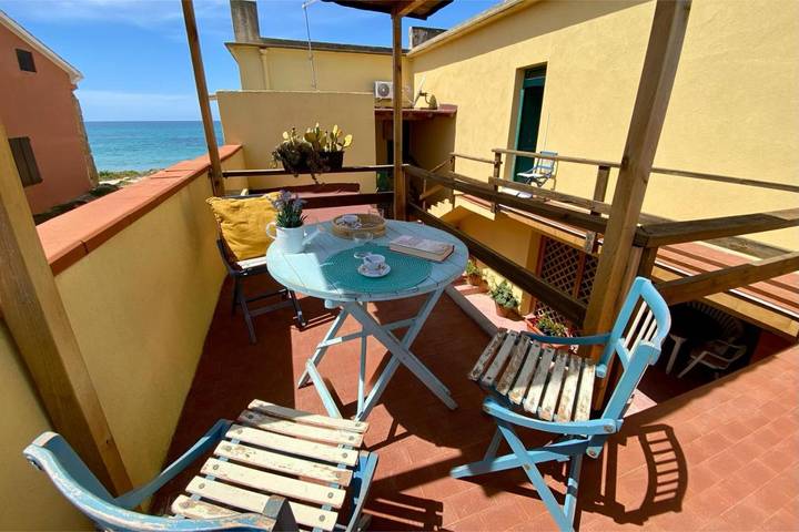 Appartamento per 3 persone, con Balcone e Terrazza nonché Giardino e Panorama a San Giovanni di Sinis