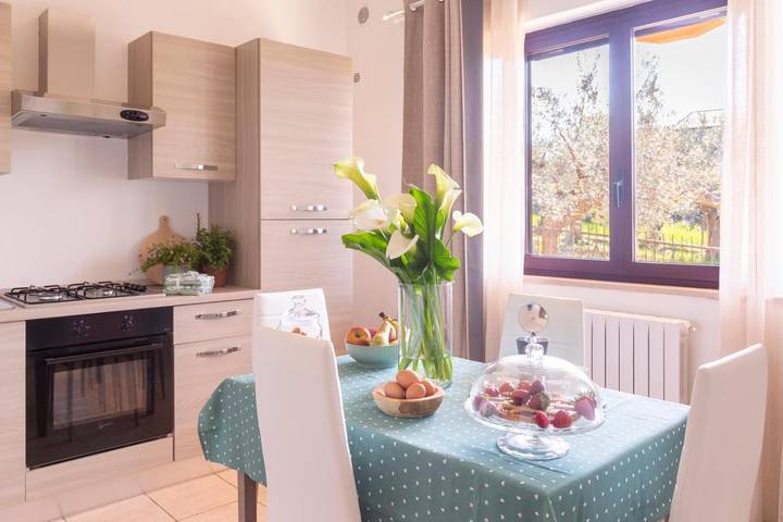 Ferienhaus für 4 Personen, mit Balkon und Garten
