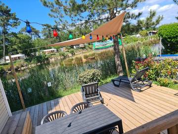 Camping pour 5 personnes, avec piscine et vue ainsi que vue sur le lac et jardin au Cap Ferret