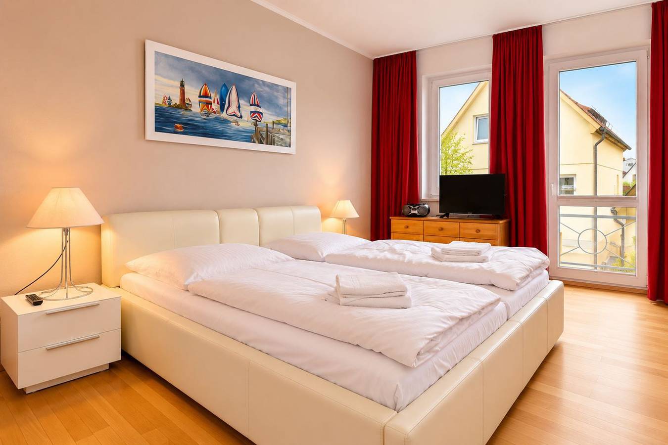 Cały apartament, Komfortable Ferienwohnung mit Balkon und Tg Platz in Warnemünde Strand, Rostock