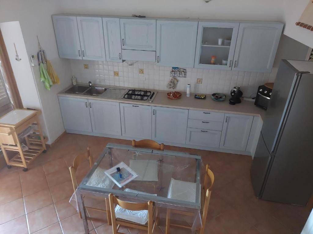 Casa Mughetto R5055 Wifi, seafront, private sea access, swimming pool in Parco Nazionale dell'Arcipelago di La Maddalena, La Maddalena