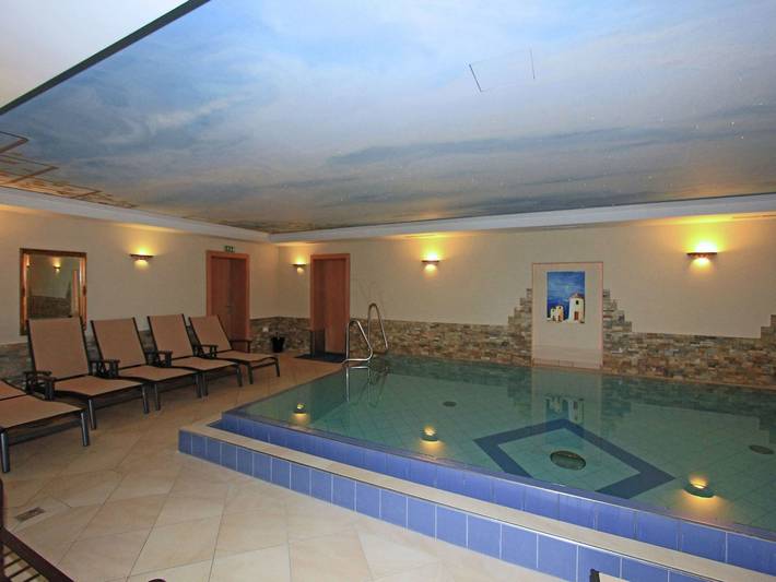 Ferienwohnung für 4 Personen, mit Balkon und Garten sowie Pool und Sauna
