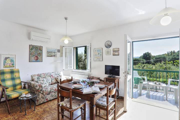 Appartamento intero, Casa Vacanze "Il Giardino Nel Sole Trilo" con aria condizionata, giardino e terrazza in Norsi, Capoliveri