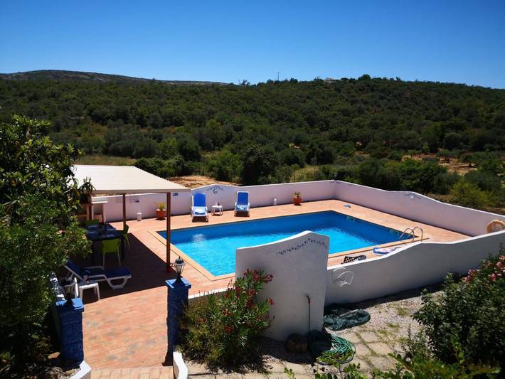 Casa de férias para 3 pessoas, com terraço e jardim e ainda piscina em Distrito de Faro
