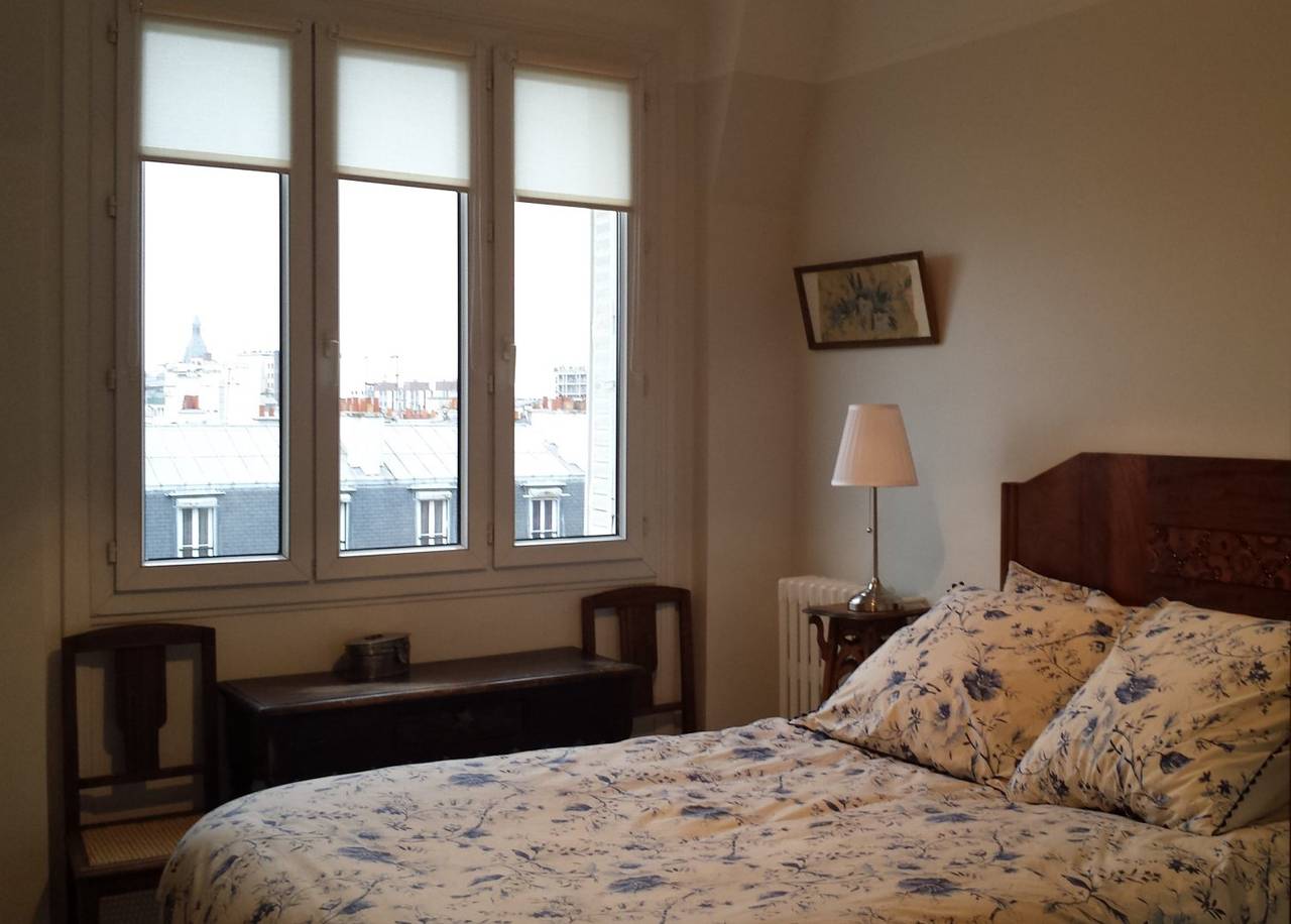 Suite de deux chambres d'hôtes - vue sur la Tour Eiffel - Belle chambre petit déjeuner avec vue Tour Eiffel in 14e arrondissement de Paris, Paris
