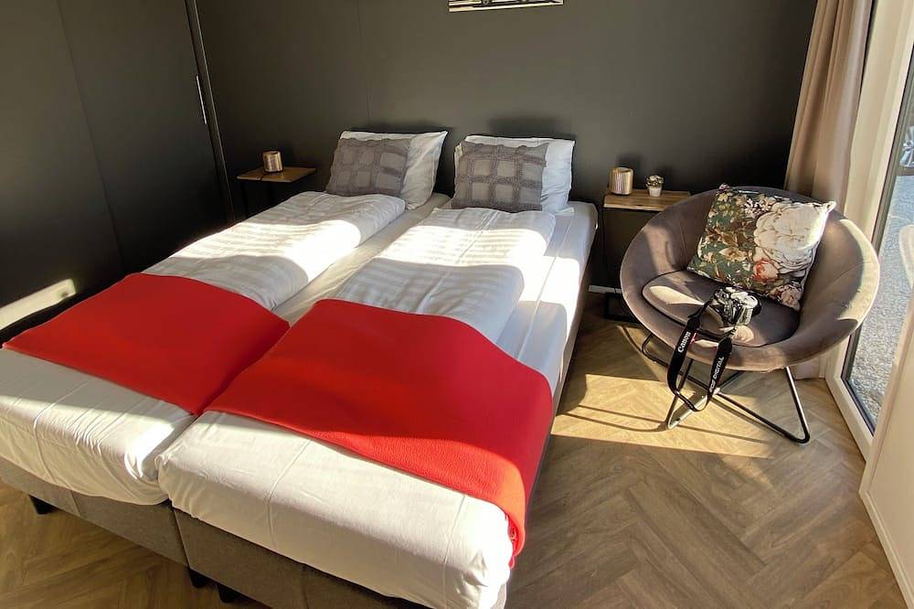 Elegantes Ferienhaus mit Steg am See Kampen Niederlande Boot Chalet Angelurlaub in Kampen, Veluwemeer