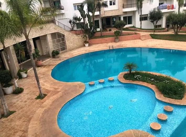 Appartement de vacances pour 5 personnes, avec vue et terrasse ainsi que piscine et jardin