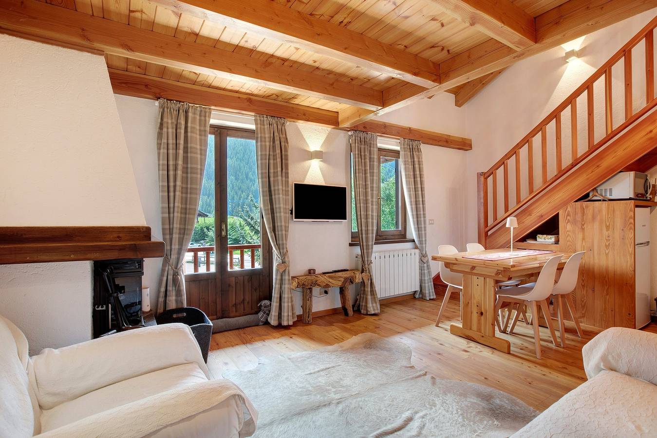 Appartement entier, Appartement 'Caterina La Thuile' avec vue sur les montagnes, jardin partagé et Wi-Fi in La Thuile (village), La Thuile