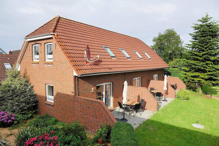 Ferienwohnung für 4 Personen, mit Terrasse und Garten in Neugarmssiel