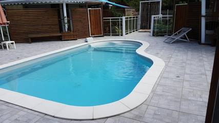 Gîte pour 4 personnes, avec piscine ainsi que jardin et vue dans Golf international de Saint François