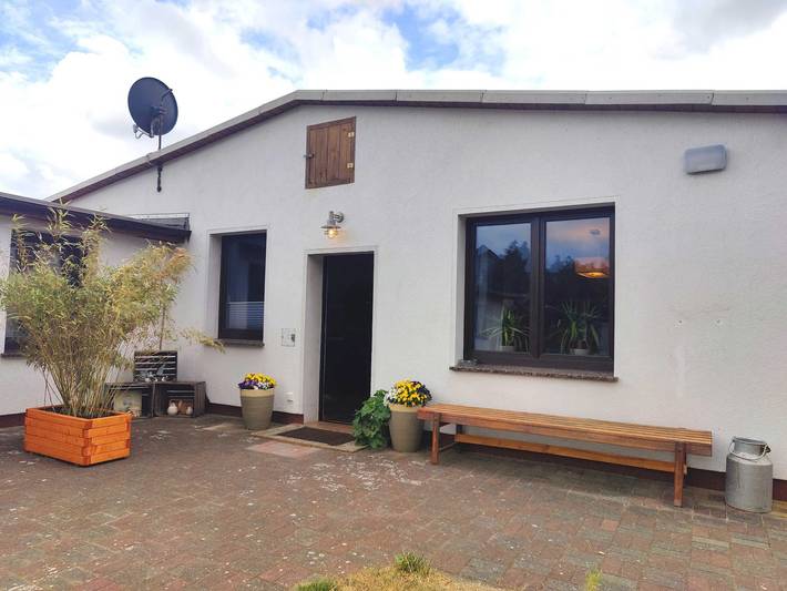Bungalow für 7 Personen, mit Terrasse und Garten