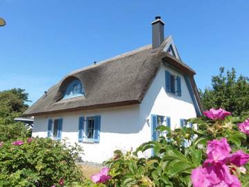 Ferienhaus für 6 Personen, mit Terrasse und Garten sowie Seeblick, mit Haustier in Ummanz