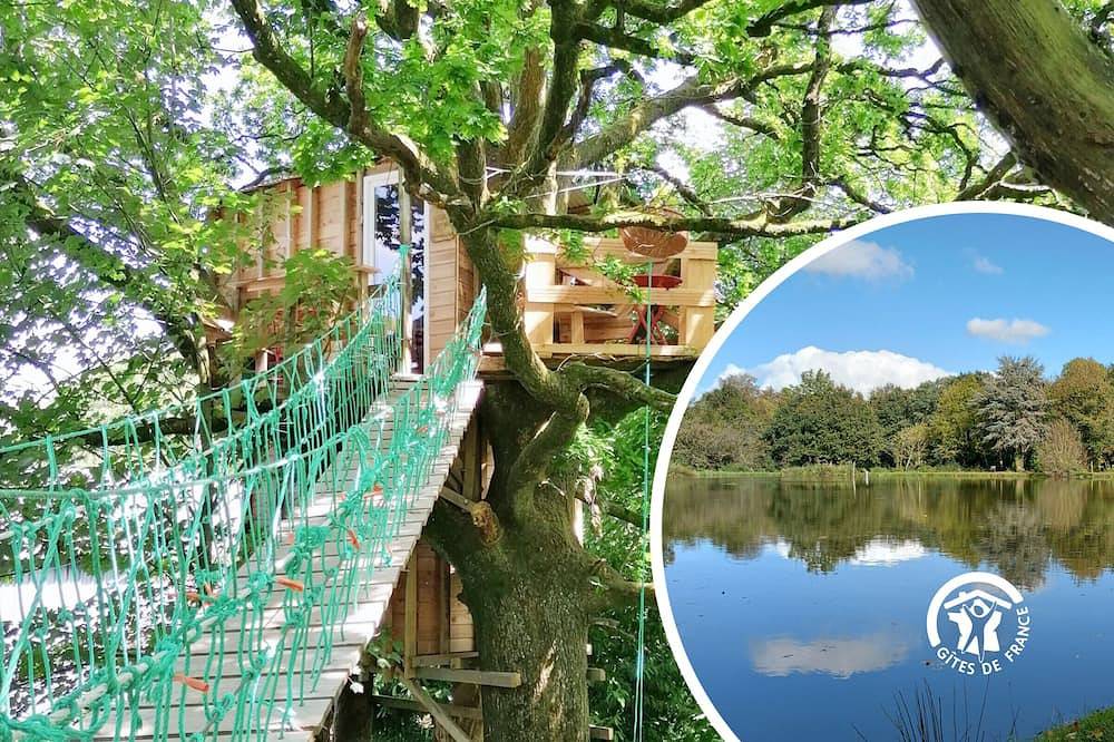 Nido acogedor en el bosque con terrazas, piscina y desayuno incluido in Saint-Thomas-de-Courceriers, Mayenne (desambiguación)