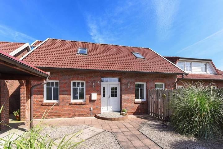 Ferienwohnung für 2 Personen, mit Terrasse und Garten sowie Ausblick in Neugarmssiel
