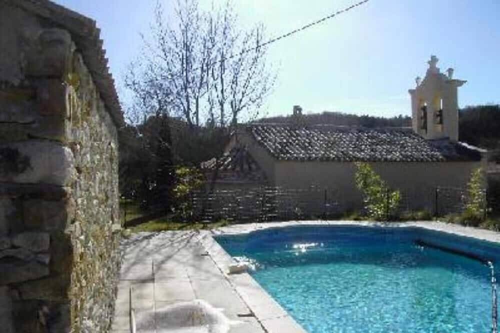 Stone house of character in a typical Provencal hamlet in Banon, Forcalquier region