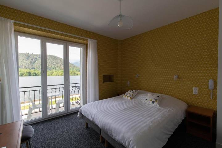 Hôtel pour 3 personnes, avec Terrasse ainsi que Vue sur le lac et Vue