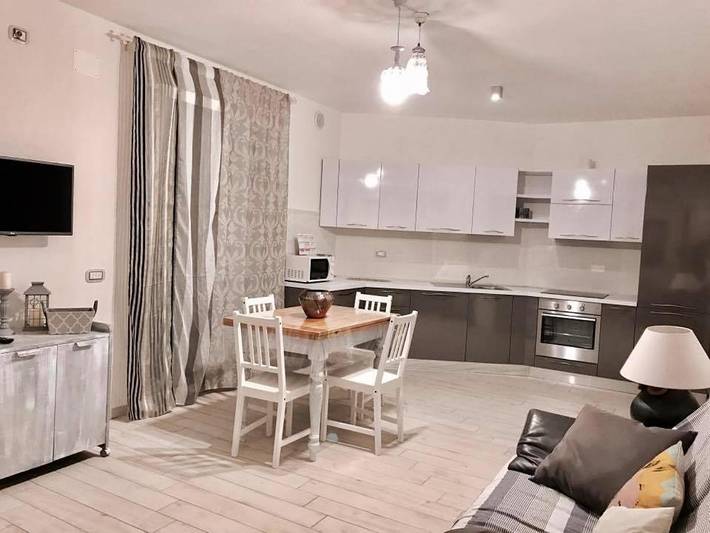 Ferienhaus für 4 Personen, mit Balkon und Whirlpool sowie Terrasse und Garten