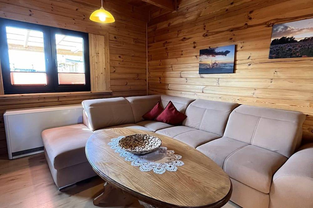 Ganze Wohnung, Holz-Ferienhaus Mechelsdorf nahe Ostseebad Kühlungsborn - 3-Raum-Holzhaus mit in Mechelsdorf, Bastorf