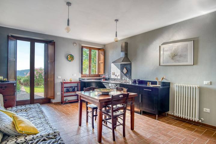 Appartamento intero, Guesthost - Casale dei Tramonti - Nature's Haven Olivi Apartment in Renovated Farmhouse with Pool in Perugia, Perugia e dintorni