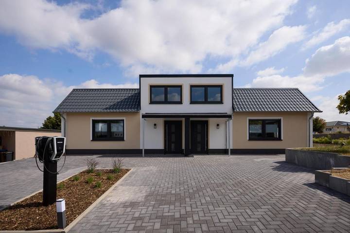 Ferienwohnung für 4 Personen, mit Balkon und Terrasse sowie Garten und Ausblick