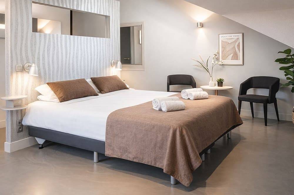 Ganze Wohnung, Genießen Sie einen entspannten Aufenthalt in unserer stilvollen Luxus-Suite in einer restaurierten alten Weberei in Oss. Ideal für Geschäfts- und Urlaubsreisende, mit Komfort und industriellem Charme. in Oss, Nordbrabant