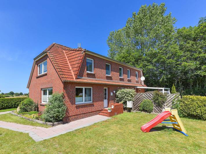 Ferienwohnung für 7 Personen, mit Terrasse und Garten sowie Seeblick