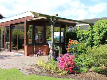 Ferienwohnung für 3 Personen, mit Terrasse und Garten in Eckwarden
