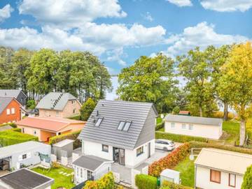 Ferienhaus für 4 Personen, mit Terrasse und Garten sowie Seeblick in Göhren-Lebbin