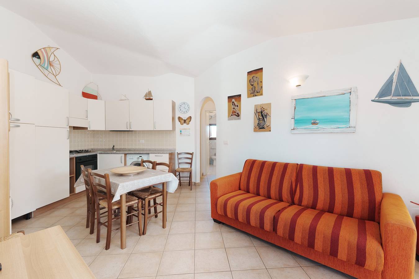 Appartement entier, Appartement « Casa Vacanze Arancia » avec piscine partagée, terrasse privée et climatisation in Maltineddu, Olbia