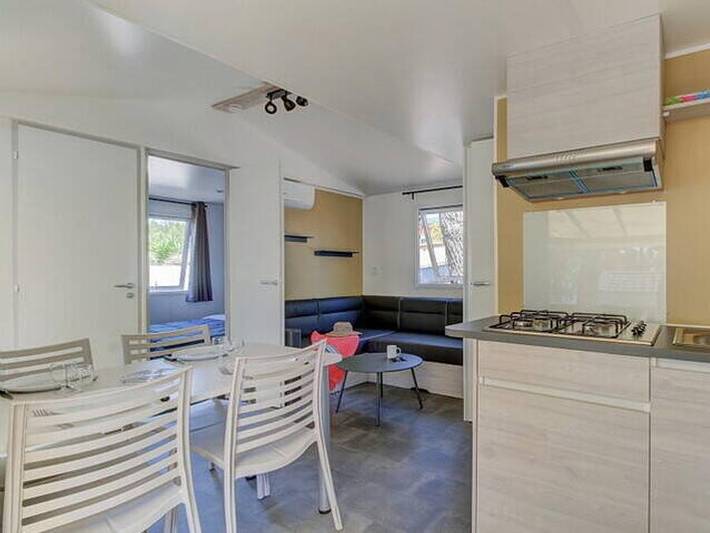 Camping Rosselba le Palme  - Mobilhome 4 personnes - Mobil-home | Premium | 2 Ch. | 4 Pers. | Terrasse Lounge | Clim. | Tv in Magazzini, Portoferraio