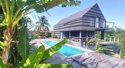 Studio pour 2 personnes, avec piscine et jardin, animaux acceptés en Guadeloupe