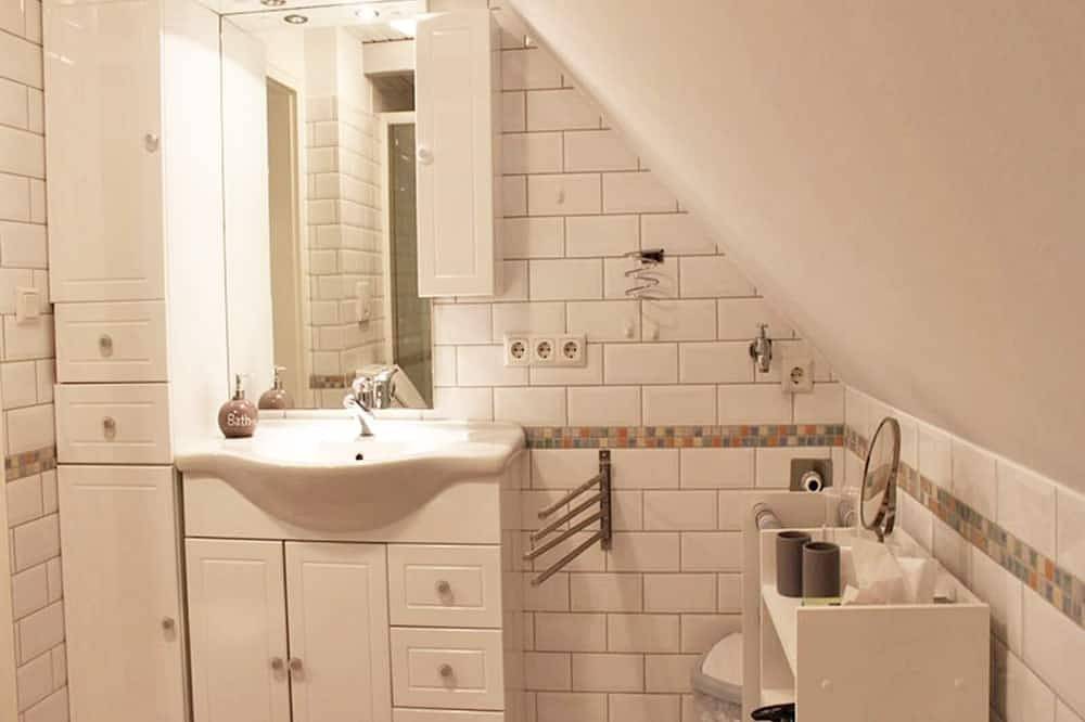 Entire apartment, Cozy 4-star vacation apartment on the top floor with a beautiful view of the St. Nikolai Church in Kappeln and its own terrace in the garden in Kappeln, Kappeln and surroundings
