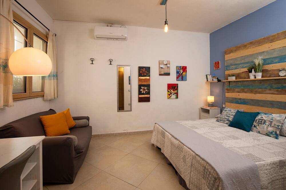 Iknos Suites by Wonderful Italy - Lily in Terranoa/Olbia, Olbia
