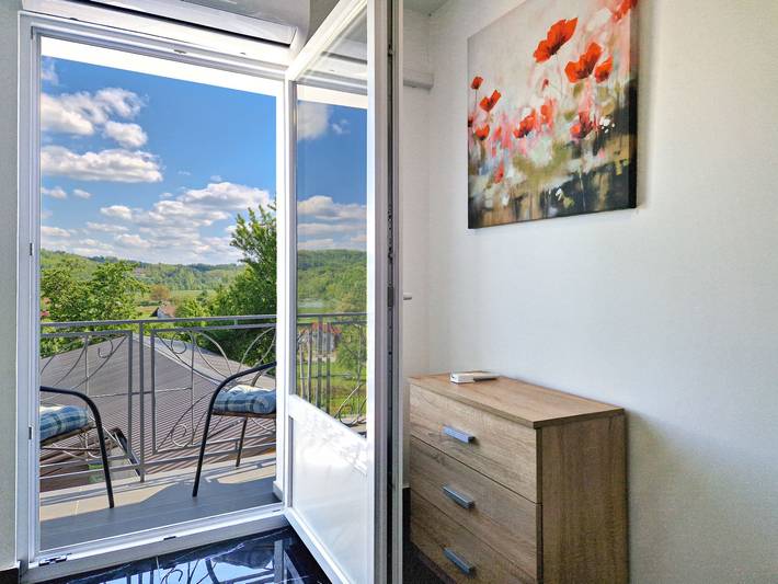 Ferienhaus für 7 Personen, mit Balkon und Terrasse sowie Garten und Ausblick