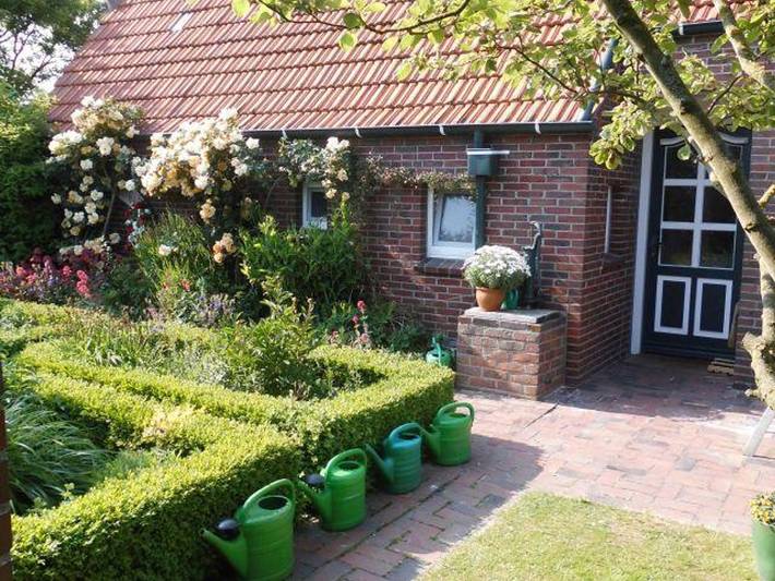 Ferienwohnung für 3 Personen, mit Terrasse und Garten in Dornum